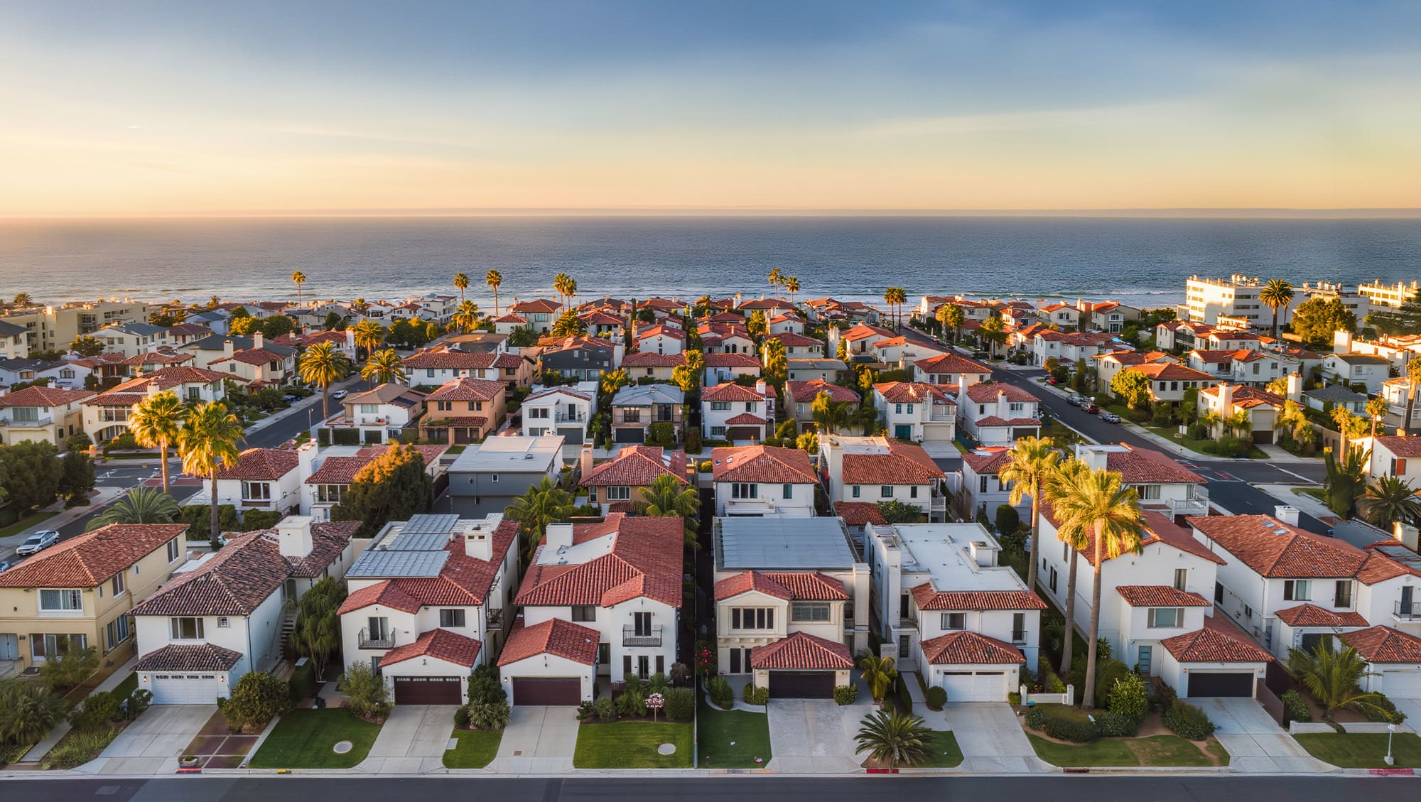 Orange County skyline at golden hour — Cali #1 Roofing service area